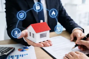 Real estate agent offers home insurance protection with digital security icons
