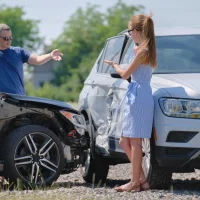 two-drivers-having-argument-over-who-is-guilty-in-car-crash-accident