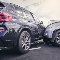 two-suvs-are-shown-in-a-collision-on-a-road